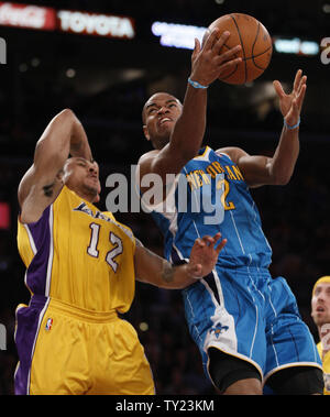 New Orleans Hornets point guard Jarrett Jack (2) goes up for a basket over Los Angeles Lakers point guard Shannon Brown (12) during the first half of Game 2 of their Western Conference Playoff series at Staples Center in Los Angeles on April 20, 2011. The Lakers defeated the Hornets 87 to 78  . UPI Photo/Lori Shepler Stock Photo