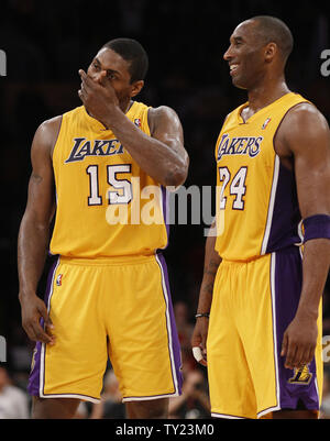 Los Angeles Lakers small forward Ron Artest (15) and Kobe Bryant share a  laugh against the New Orleans Hornets during the first half of Game 2 of  their Western Conference Playoff series