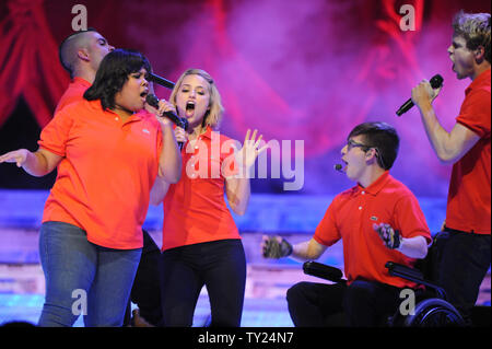 Amber Riley, Dianna Agron, Kevin McHale and Chord Overstreet (L-R) perform on the Glee! concert tour at Staples Center in Los Angeles on May 28, 2011.   UPI/Jim Ruymen Stock Photo