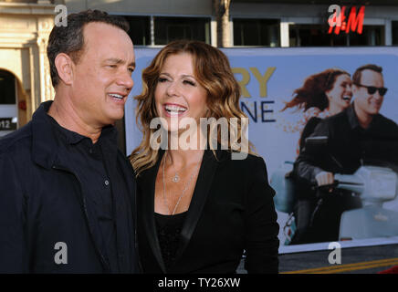 Director/writer/producer/actor Tom Hanks and his wife and cast member Rita Wilson arrive for the premiere of the motion picture romantic comedy drama 'Larry Crowne', at Grauman's Chinese Theatre in the Hollywood section of Los Angeles on June 27, 2011.    UPI/Jim Ruymen Stock Photo