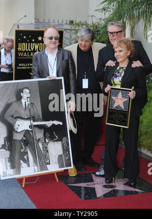 The late Buddy Holly receives a posthumous Walk of Fame Star on his 75th birthday on Vine Street in front of The Capitol Records Building, in Los Angeles on September 7, 2011.  L-R; John Asher, Phil Everly, Gary Busey and Maria Elena Holly in front of Buddy Holly's star.   UPI/Jayne Kamin-Oncea Stock Photo