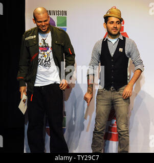 Rene Perez (L) and Eduardo Cabra, members of the urban/hip-hop duo Calle 13 wait to announce nominations for the 12th annual Latin Grammy Awards, during a news conference at the Avalon Theatre in the Hollywood section of Los Angeles on September 14, 2011. The duo - which already has won 10 Latin Grammy Awards, garnered 10 nominations for this year's Grammy's, a new record.  The winners will be announced in Las Vegas on November 10.  UPI/Jim Ruymen Stock Photo