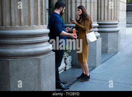 Smoking break, downtown Los Angeles, California, United States of America Stock Photo