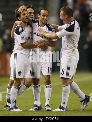 Los Angeles Galaxy forward Landon Donovan (10) celebrates with a teammates after scoring a goal on a penalty kick against the New York Red Bulls in the second half in the MLS Western Conference Semifinals game at the Home Depot Center in Carson, California on Nov. 3, 2011. The Galaxy won 2-1. UPI/Lori Shepler Stock Photo