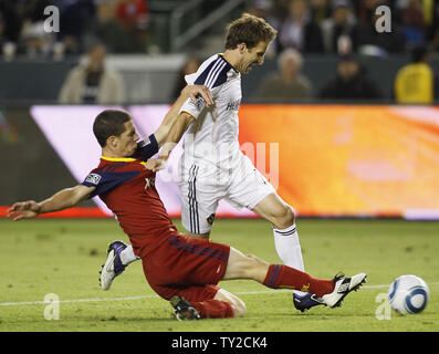 Los Angeles Galaxy forward Mike Magee, right, is fouled by Real Salt Lake midfielder Will Johnson, left, in the second half in the MLS Western Conference Final game at the Home Depot Center in Carson, California on Nov. 6, 2011.  The Galaxy won 3-1.  UPI/Lori Shepler. Stock Photo