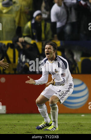 Los Angeles Galaxy midfielder David Beckham (23) celebrates a goal by Landon Donovan (10) against the Houston Dynamo in the second half of the MLS Cup at the Home Depot Center in Carson, California on Nov. 20, 2011. The Galaxy won 1-0.    UPI/Lori Shepler. Stock Photo