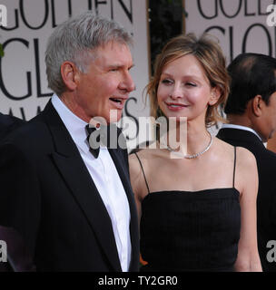 Actor Harrison Ford and his wife, actress Calista Flockhart arrive at the 69th annual Golden Globe Awards in Beverly Hills, California on January 15, 2012.  UPI/Jim Ruymen Stock Photo