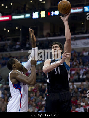 Minnesota Timberwolves Darko Milicic shoots over Los Angeles Clippers' DeAndre Jordan during second quarter action at Staples Center January 20, 2012. The Timberwolves defeated the Clippers 101-98.  UPI/Jon SooHoo Stock Photo