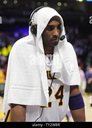 Los Angeles Lakers' Kobe Bryant (24) talks on the radio after  Game 1 of their Western Conference playoffs at Staples Center  against the Denver Nuggets in Los Angeles on April 29, 2012. Lakers won 103-88. UPI Photo/Lori Shepler Stock Photo