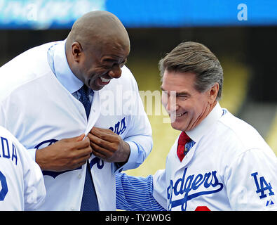 Former Los Angeles Dodgers known as The Infield Ron Cey (L to R), Bill  Russell, Davey Lopes and Steve Garvey take the field to throw out the  ceremonial first pitch prior to