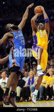 Los Angeles Lakers guard Kobe Bryant (24) shoots over Oklahoma City Thunder guard James Harden (13) during the first half of game 3 of the Western Conference Semifinals at Staples Center in Los Angeles on May 18, 2012. UPI /Lori Shepler Stock Photo