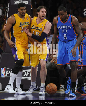 Los Angeles Lakers power forward Pau Gasol (16) celebrates with Andrew  Bynum (17) after he dunked over Oklahoma City Thunder center Kendrick  Perkins (5) during the second half of game 3 of the Western Conference  Semifinals at Staples Center in Los