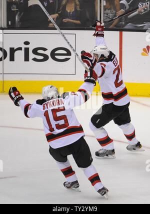 New Jersey Devils center Patrik Elias (26) and right wing Petr Sykora (15) celebrate after scoring a goal on the Los Angeles Kings in the third period of Game 4 of the NHL Stanley Cup Finals at the Staples Center in Los Angeles, California on June 6, 2012. The Devils won 3-1. UPI/Lori Shepler. Stock Photo