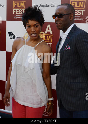 Actress Angela Bassett, a cast member in the motion picture drama 'Middle of Nowhere', attends the premiere of the film with her husband, actor Courtney B. Vance as part of the LA Film Festival, at Regal Cinemas L.A. Live in Los Angeles on June 20, 2012.  UPI/Jim Ruymen Stock Photo