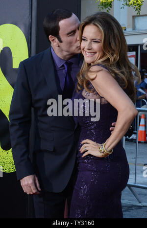 Actor John Travolta, a cast member in the motion picture crime thriller 'Savages', attends the premiere of the film with his wife, actress Kelly Preston at Mann Village Theatre in Los Angeles on June 25, 2012.  UPI/Jim Ruymen Stock Photo