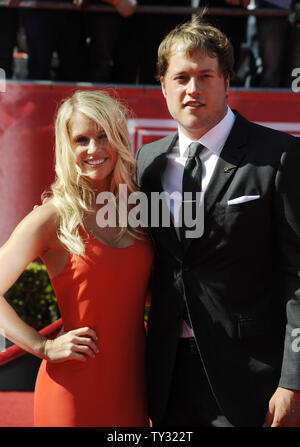 NFL player Matthew Stafford of the Detroit Lions (R) and guest arrive for the ESPY Awards at Nokia Theatre in Los Angeles on July 11, 2012.  UPI/Phil McCarten Stock Photo