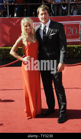 NFL player Matthew Stafford of the Detroit Lions (R) and guest arrive for the ESPY Awards at Nokia Theatre in Los Angeles on July 11, 2012.  UPI/Phil McCarten Stock Photo