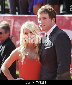 NFL player Matthew Stafford of the Detroit Lions (R) and guest arrive for the ESPY Awards at Nokia Theatre in Los Angeles on July 11, 2012.  UPI/Phil McCarten Stock Photo