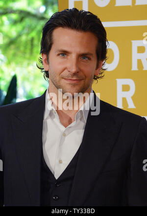 Actor Bradley Cooper arrives at the Hollywood Foreign Press Association's annual installation luncheon, held at the Beverly Hills Hotel in Beverly Hills, California on August 9, 2012.  UPI/Jm Ruymen Stock Photo