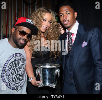 Mariah Carey attends the BMI Urban Music Awards with her husband Nick Cannon (R) and Jermaine Dupri, where she was honored as an 'icon' in Beverly Hills, California on September 7, 2012.   UPI/Arnold Turner Stock Photo