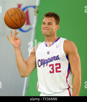 Los Angeles Clippers Blake Griffin dunks the ball by Boston Celtics Jordan  Crawford during first half action in Los Angeles on January 8, 2014. The  Clippers lead the Celtics at halftime 59-55.