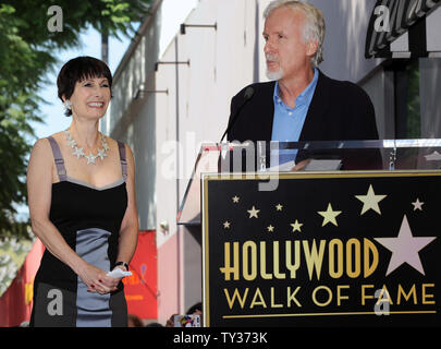 Producer Gale Anne Hurd (L) reacts to comments by director James Cameron, her former husband, during an unveiling ceremony honoring her with the 2,482nd star on the Hollywood Walk of Fame in Los Angeles on October 3, 2012. Hurd's career was launched when she produced 'The Terminator', written and directed by James Cameron.  UPI/Jim Ruymen Stock Photo