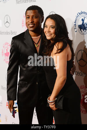 Kenny 'Babyface' Edmonds and Nicole Pantenburg attend the 26th Carousel of Hope gala to benefit the Barbara Davis Center for Childhood Diabetes in Beverly Hills, California on October 20, 2012. Actor George Clooney was honored with the Brass Ring Award for his outstanding artistic achievements and humanitarian undertakings.  UPI/Jim Ruymen Stock Photo