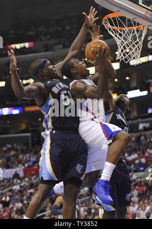 Los Angeles Clippers point guard Eric Bledsoe (12) is fouled by Memphis Grizzlies power forward Zach Randolph (50) in the second half of an NBA basketball game in Los Angeles on October 31, 2012.  The Clippers won 101 to 92.  UPI/Lori Shepler Stock Photo
