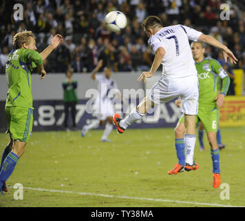 Los Angeles Galaxy forward Robbie Keane (7) scores a goal against the Seattle Sounders in the first half of an MLS Western Conference Finals game at the Home Depot Center in Carson, California on Nov. 11, 2012.    UPI/Lori Shepler. Stock Photo