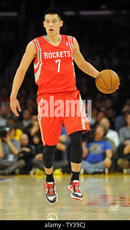 Houston Rockets point guard Jeremy Lin (7) brings the ball upcourt against the Los Angeles Lakers in the first half of an NBA basketball game in Los Angeles on November 18, 2012.    UPI/Lori Shepler Stock Photo