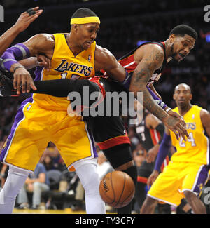 Los Angeles Lakers center Dwight Howard (12) and Miami Heat power forward Udonis Haslem (40) battle for the ball in the first half at Staples Center in Los Angeles on January 17,  2013.    UPI/Lori Shepler Stock Photo