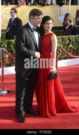 Actor Alec Baldwin and wife Hilaria Thomas arrive for the 19th Annual SAG Awards held at the Shrine Auditorium in Los Angeles on on January 27, 2013.   UPI/Phil McCarten Stock Photo
