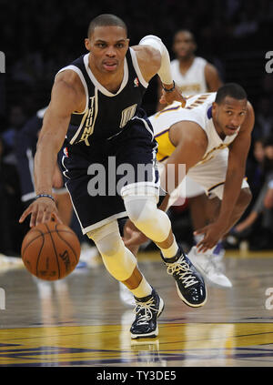 Oklahoma City Thunder point guard Russell Westbrook (0) steals the ball from Los Angeles Lakers point guard Chris Duhon, right, in the second half at Staples Center in Los Angeles on January 27, 2013. Lakers 105 to 96. UPI/Lori Shepler Stock Photo