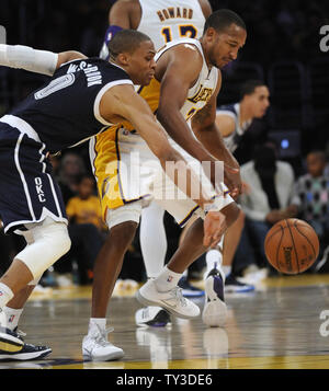Oklahoma City Thunder point guard Russell Westbrook (0) steals the ball from Los Angeles Lakers point guard Chris Duhon, right, in the second half at Staples Center in Los Angeles on January 27, 2013. Lakers 105 to 96. UPI/Lori Shepler Stock Photo