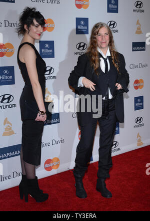 Singer Patti Smith and her daughter Jesse Smith arrive at the Clive Davis pre-Grammy party and salute to Antonio 'L.A.' Reid, at the Beverly Hilton Hotel in Beverly Hills, California on February 9, 2013.  UPI/Jim Ruymen Stock Photo