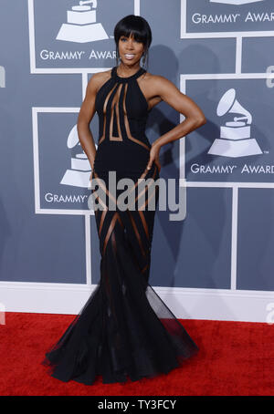 Kelly Rowland arrives at the 55th annual Grammy Awards wearing a dress ...