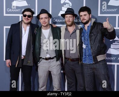 Marcus Mumford, Ben Lovett, 'Country' Winston Marshall and Ted Dwane (L-R) of Mumford & Sons, arrive at the 55th Annual GRAMM arrives at the 55th annual Grammy Awards at Staples Center in Los Angeles on February 10, 2013. 'Babel' by the British folk rock band was named Album of the Year at the Grammy Awards ceremony.  UPI/Jim Ruymen.. Stock Photo