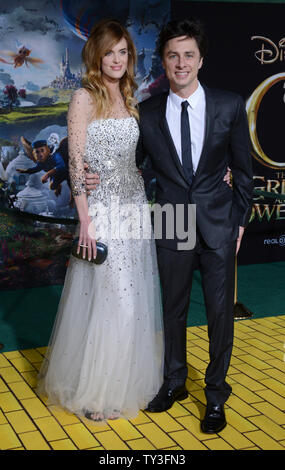 Actor Zach Braff, a cast member in the motion picture adventure fantasy' 'Oz The Great and Powerful'', attends the premiere of the film with model Taylor Bagley, at El Capitan Theatre in the Hollywood section of Los Angeles on February 13, 2013.  UPI/Jim Ruymen Stock Photo