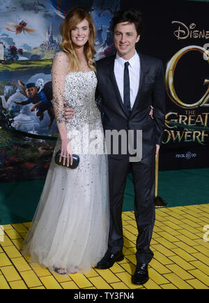 Actor Zach Braff, a cast member in the motion picture adventure fantasy' 'Oz The Great and Powerful'', attends the premiere of the film with model Taylor Bagley, at El Capitan Theatre in the Hollywood section of Los Angeles on February 13, 2013.  UPI/Jim Ruymen Stock Photo