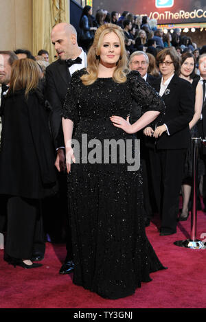 Singer Adele arrives on the red carpet at the 85th Academy Awards at the Hollywood and Highlands Center in the Hollywood section of Los Angeles on February 24, 2013. UPI/Jim Ruymen Stock Photo