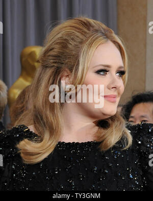 Singer Adele arrives on the red carpet at the 85th Academy Awards at the Hollywood and Highlands Center in the Hollywood section of Los Angeles on February 24, 2013. UPI/Jim Ruymen Stock Photo