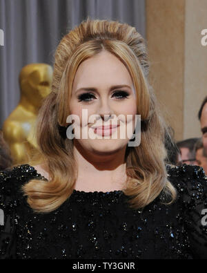 Singer Adele arrives on the red carpet at the 85th Academy Awards at the Hollywood and Highlands Center in the Hollywood section of Los Angeles on February 24, 2013. UPI/Jim Ruymen Stock Photo