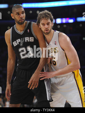 San Antonio Spurs power forward Tim Duncan (21) and Los Angeles Lakers power forward Pau Gasol (16)  in the first half at Staples Center in Los Angeles on April 14, 2013. UPI/Lori Shepler Stock Photo
