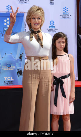 Actress Jane Fonda (L) poses with her granddaughter Viva Vadim during a hand & footprint ceremony honoring Fonda as part of the TCM Classic Film Festival, at TCL Chinese Theatre in the Hollywood section of Los Angeles on April 27, 2013. UPI/Jim Ruymen Stock Photo