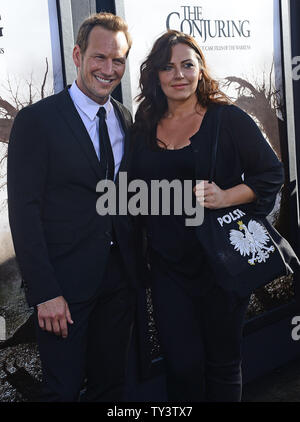 Actor Patrick Wilson attends with his wife Dagmara Dominczyk attends the premiere of 'The Conjuring' at the Cinerama Dome in Los Angeles on July 15, 2013.  Based upon a true story, the movie tells of world renowned paranormal investigators Ed and Lorraine Warren and how they were called upon to help a terrorized family at a secluded farmhouse.     UPI/Jim Ruymen Stock Photo