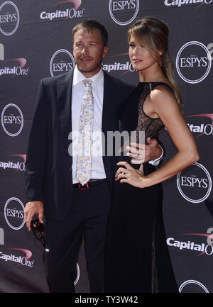 Skier Bode Miller and his wife Morgan Beck attend the 2013 ESPY Awards at the Nokia Theatre L.A. Live in Los Angeles on July 17, 2013.   UPI/Jim Ruymen Stock Photo