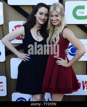 Actresses Kat Dennings )L) and Beth Behrs attend the CBS and Showtime summer TCA party in Beverly Hills, California on July 29, 2013.  UPI/Jim Ruymen Stock Photo