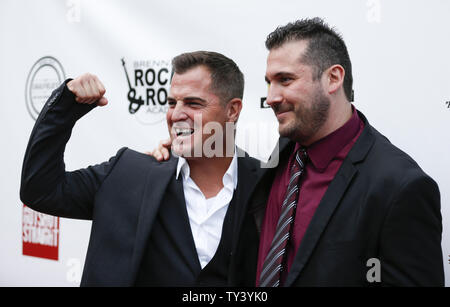 Cast member George Eads (L) and director Justin Steele attend the premiere of the motion picture thriller 'Gutshot Straight', at the Zanuck Theatre at Fox Studios in Los Angeles on August 12, 2013.  The crime story follows Eads’s Jack, a poker player who takes on Lang and Levine brothers in the Vegas underworld, with AnnaLynne McCord playing a femme fatale involved in the treachery.    UPI/Danny Moloshok Stock Photo