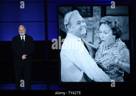 Actor Rob Reiner delivers a memoriam for 'All in the Family' star Jean Stapleton and Carroll O'Connor at the 65th annual Primetime Emmy Awards at Nokia Theatre in Los Angeles on September 22, 2013.   UPI/Jim Ruymen Stock Photo