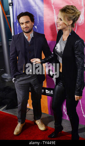 Cast member Johnny Galecki and his girlfriend, actress Kelli Garner attend the premiere of the music history motion picture 'CBGB' at the ArcLight Cinerama Dome in the Hollywood section of Los Angeles on October 1, 2013. 'CBGB' follows the story of Hilly Kristal's New York club from its concept as a venue for Country, Bluegrass and Blues (CBGB) to what it ultimately became: the birthplace of underground rock 'n roll and punk. UPI/Jim Ruymen Stock Photo